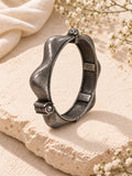 Niska oxidized silver-tone scalloped bangle replica upright view