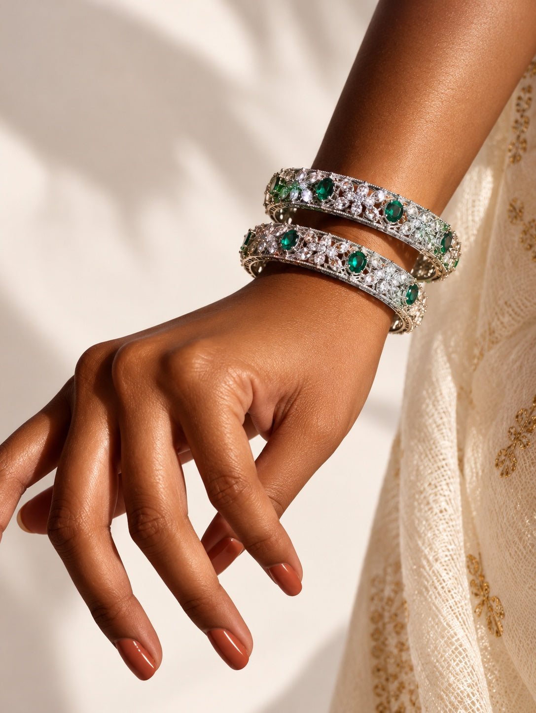 AD stone dual colour stone silver plated bangle worn on hand