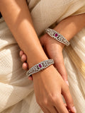 BA26N20029 bangle worn on model
