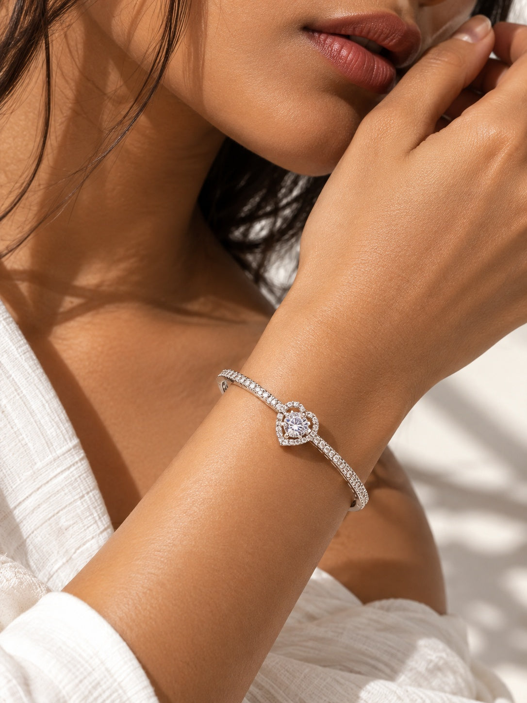 BR26N20033 silver heart stone bangle worn on model