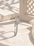 BR26N20033 silver heart bangle on ivory stone with hard sunlight