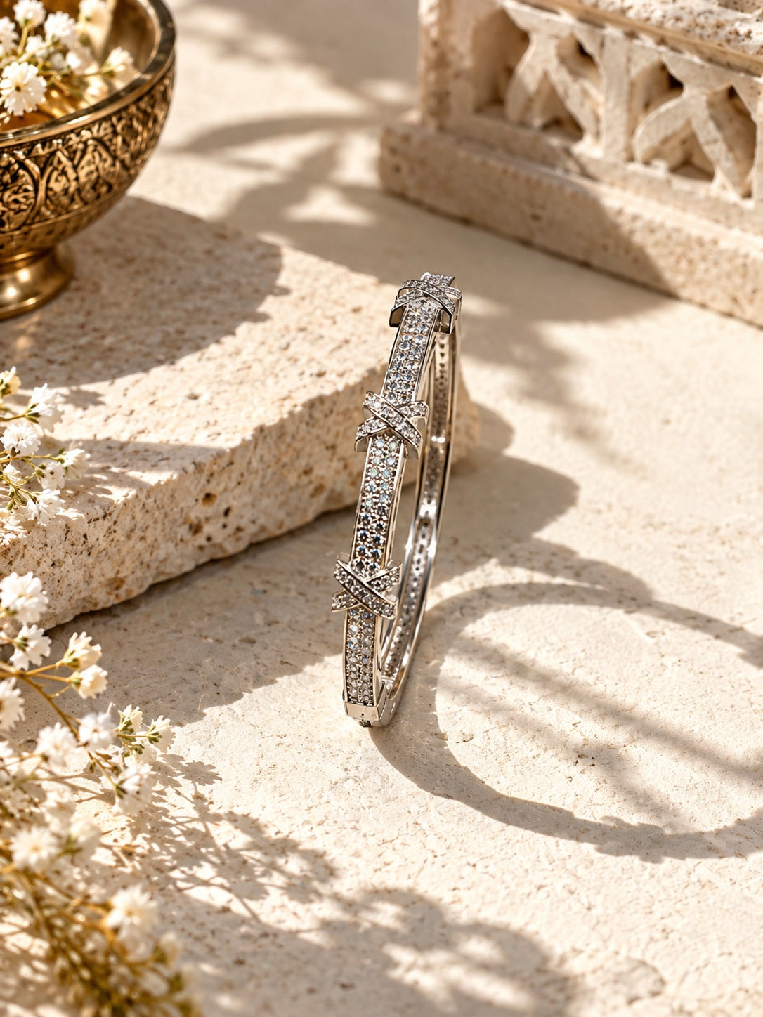 Silver plated AD stone bangle on an ethnic ivory stone setup