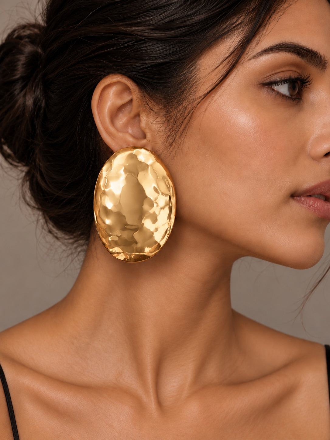 Gold tone oval statement earrings