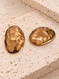 Gold tone oval statement earrings