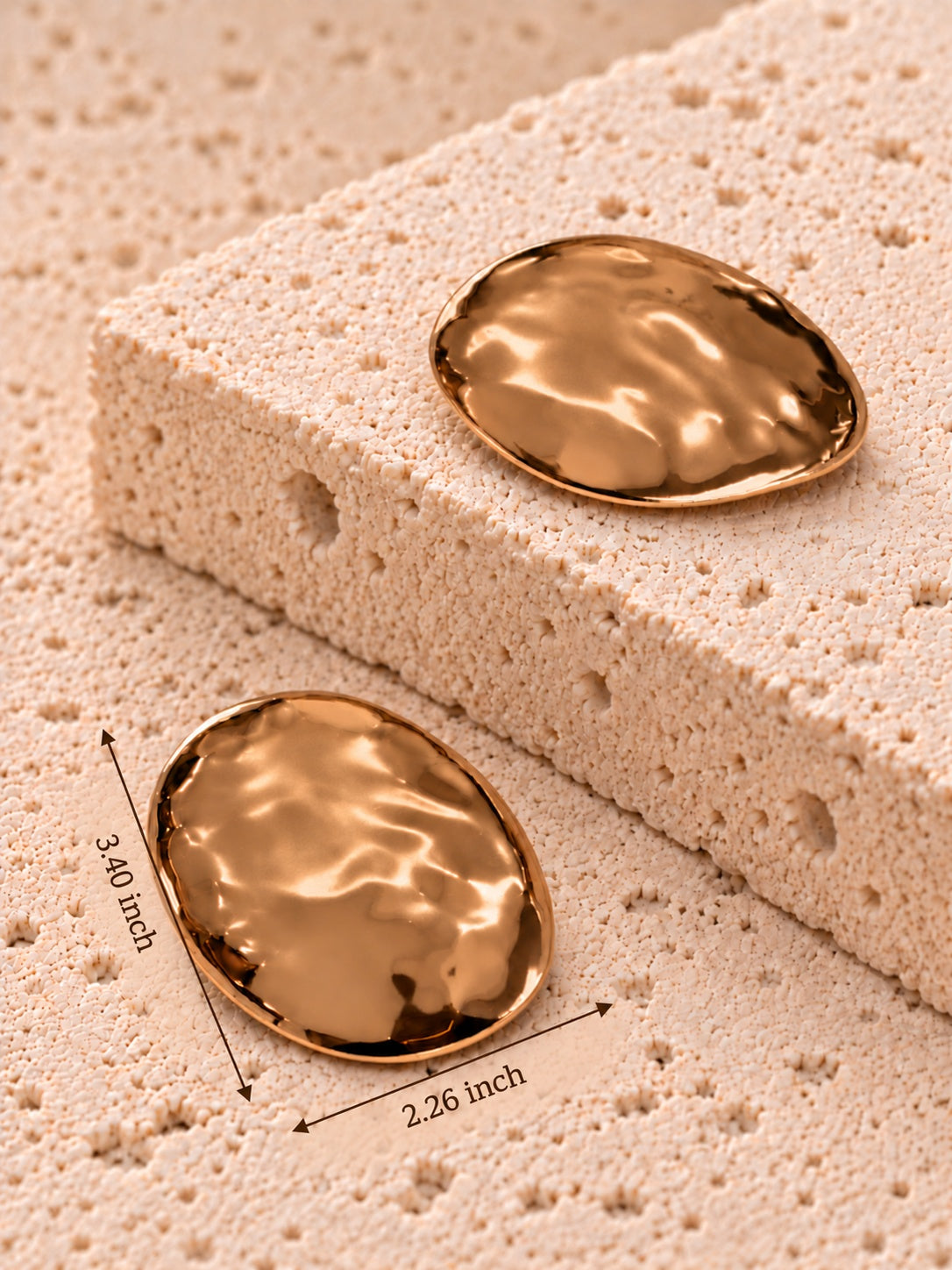 Gold tone oval earrings sizing: 3.40 inch length and 2.26 inch breadth