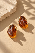 Amber resin stone gold earrings from alternate angle
