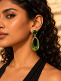 Niska green Resin teardrop earrings worn by model