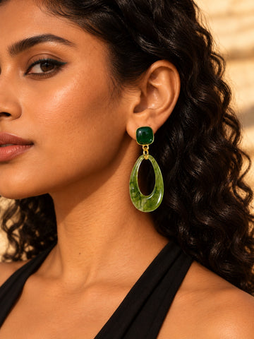 Niska green Resin teardrop earrings worn by model