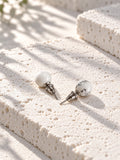 Niska white marble-effect Resin stud earrings – flat product view
