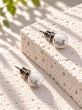 Niska white marble-effect Resin stud earrings – two-level travertine display
