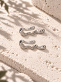 Niska silver-tone fluid wave statement earrings on white travertine – view 7 – ER26N10241