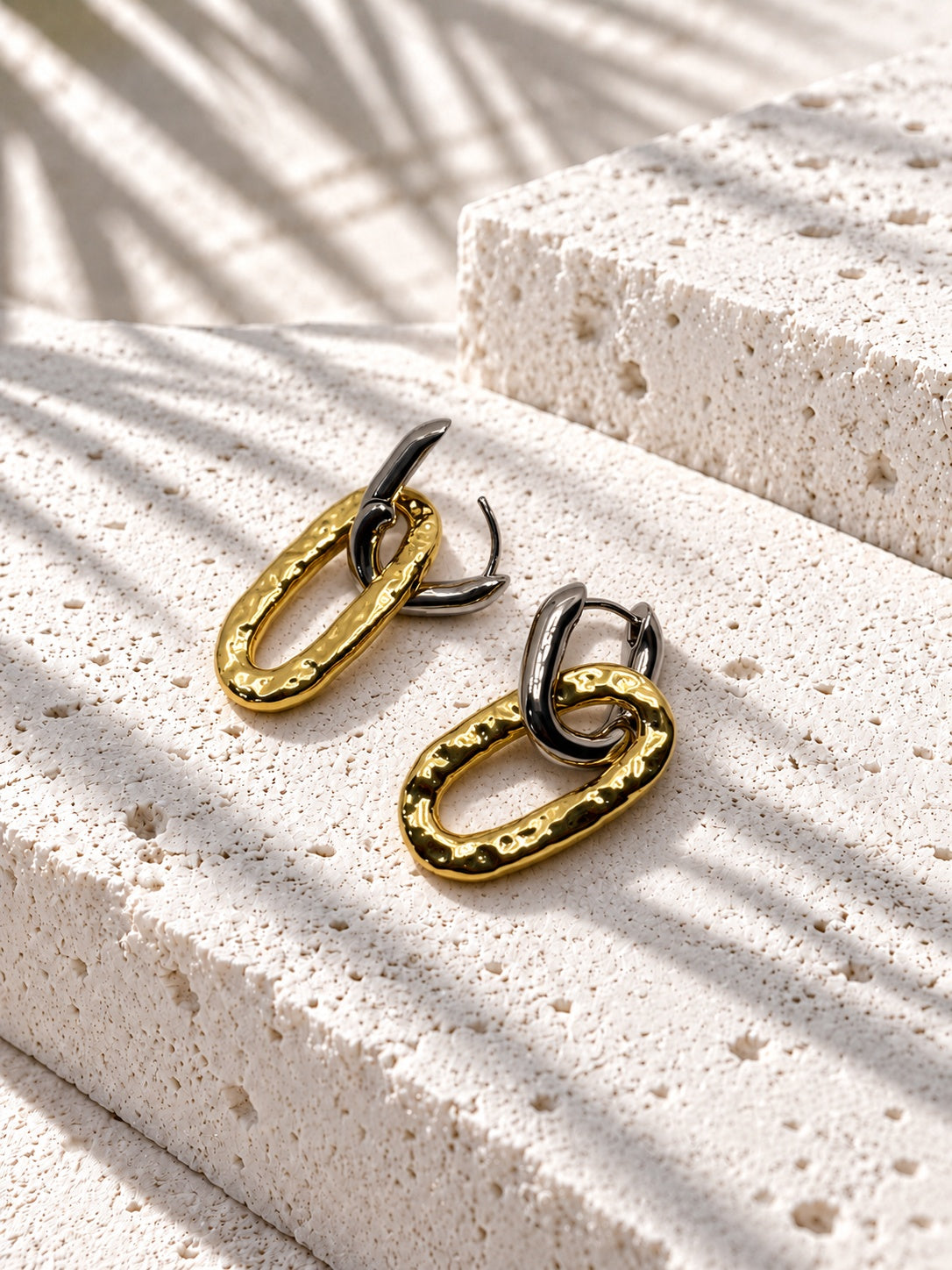 Niska two-tone hammered oval link hoop earrings – open-clasp view