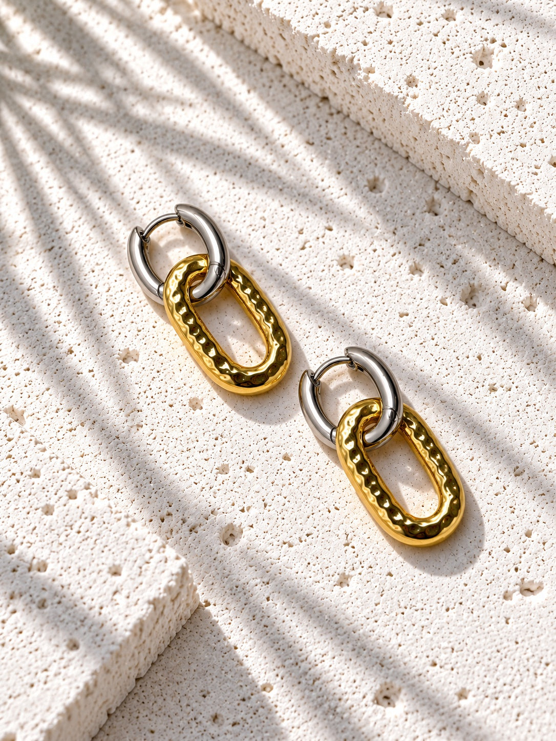 Niska two-tone hammered oval link hoop earrings – overhead view