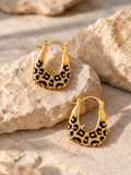 Gold leopard-print hoop earrings close-up