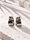 Niska silver-tone sculptural alloy hoop earrings front view
