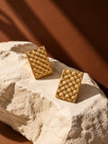 Gold woven rectangular earrings, close-up angle