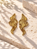 Niska gold-tone sculpted leaf Resin earrings on white travertine – view 4