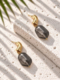 Niska smoky grey marbled resin drop earrings, product angle 1