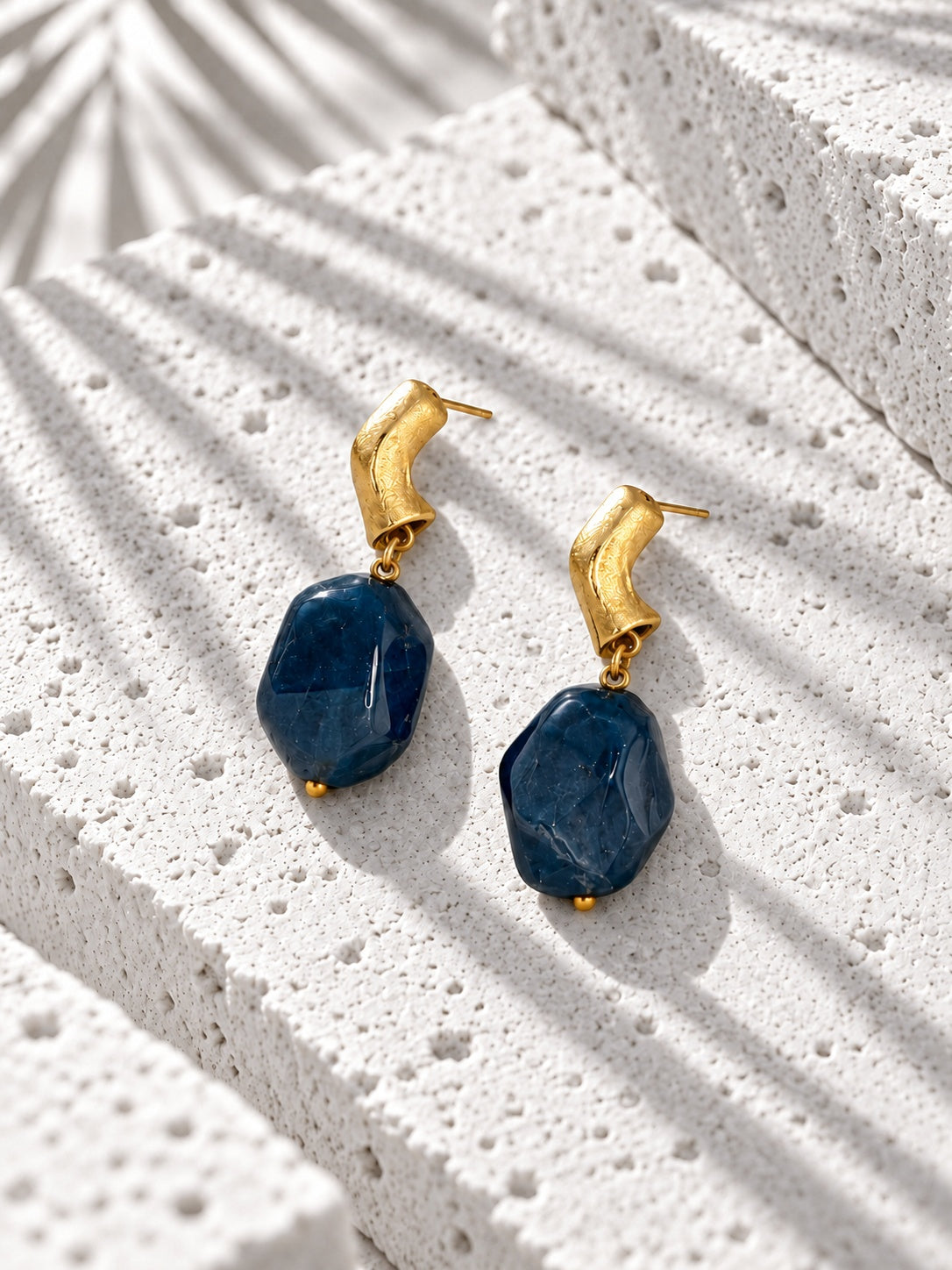 Blue resin and gold-tone drop earrings