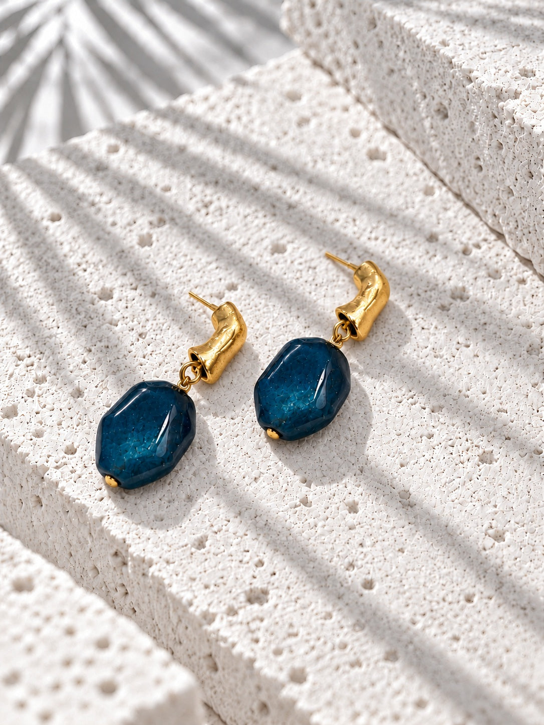 Blue resin and gold-tone drop earrings