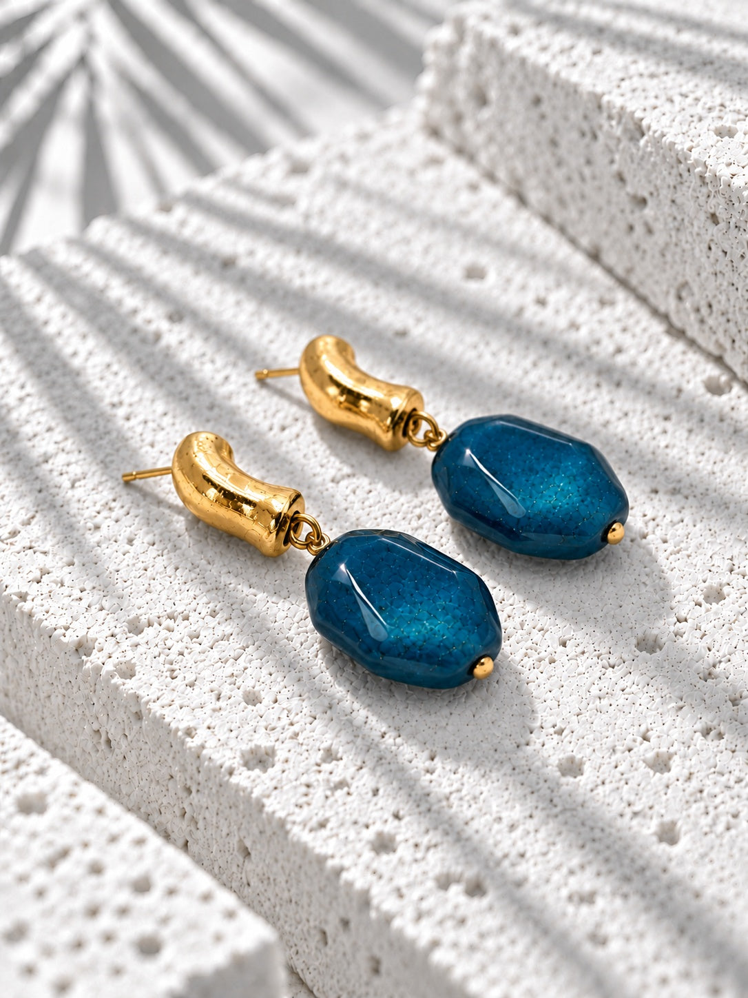 Blue resin and gold-tone drop earrings