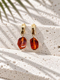 Niska cognac amber colour and gold-tone drop earrings