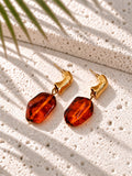 Niska cognac amber colour and gold-tone drop earrings