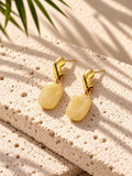 Pale yellow gold-tone drop earrings