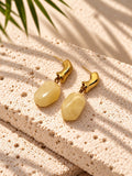 Pale yellow gold-tone drop earrings
