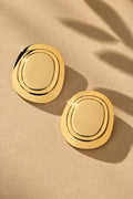 ER26N10277 gold concentric oval statement earrings – product angle 1