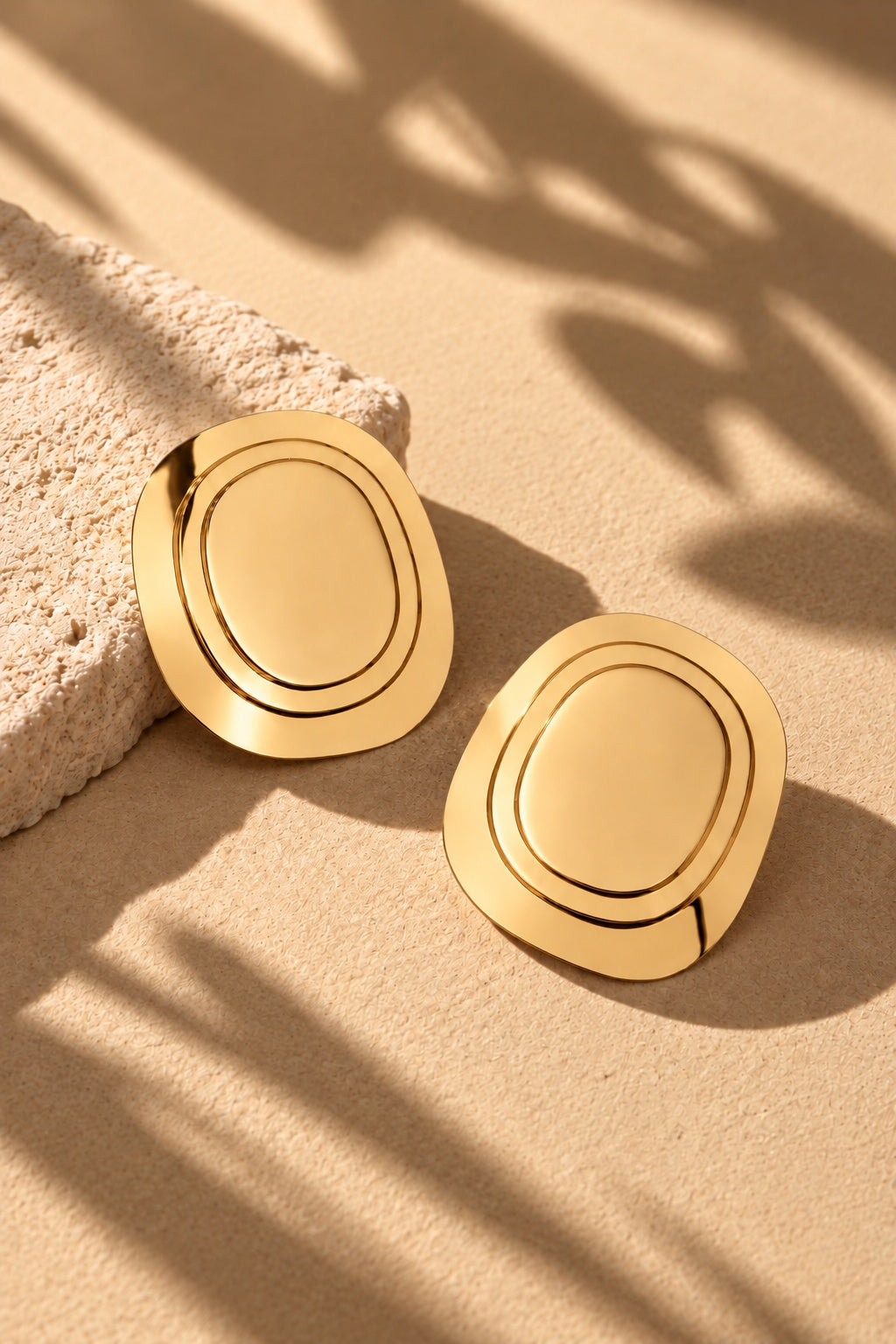 ER26N10277 gold concentric oval statement earrings – product angle 4