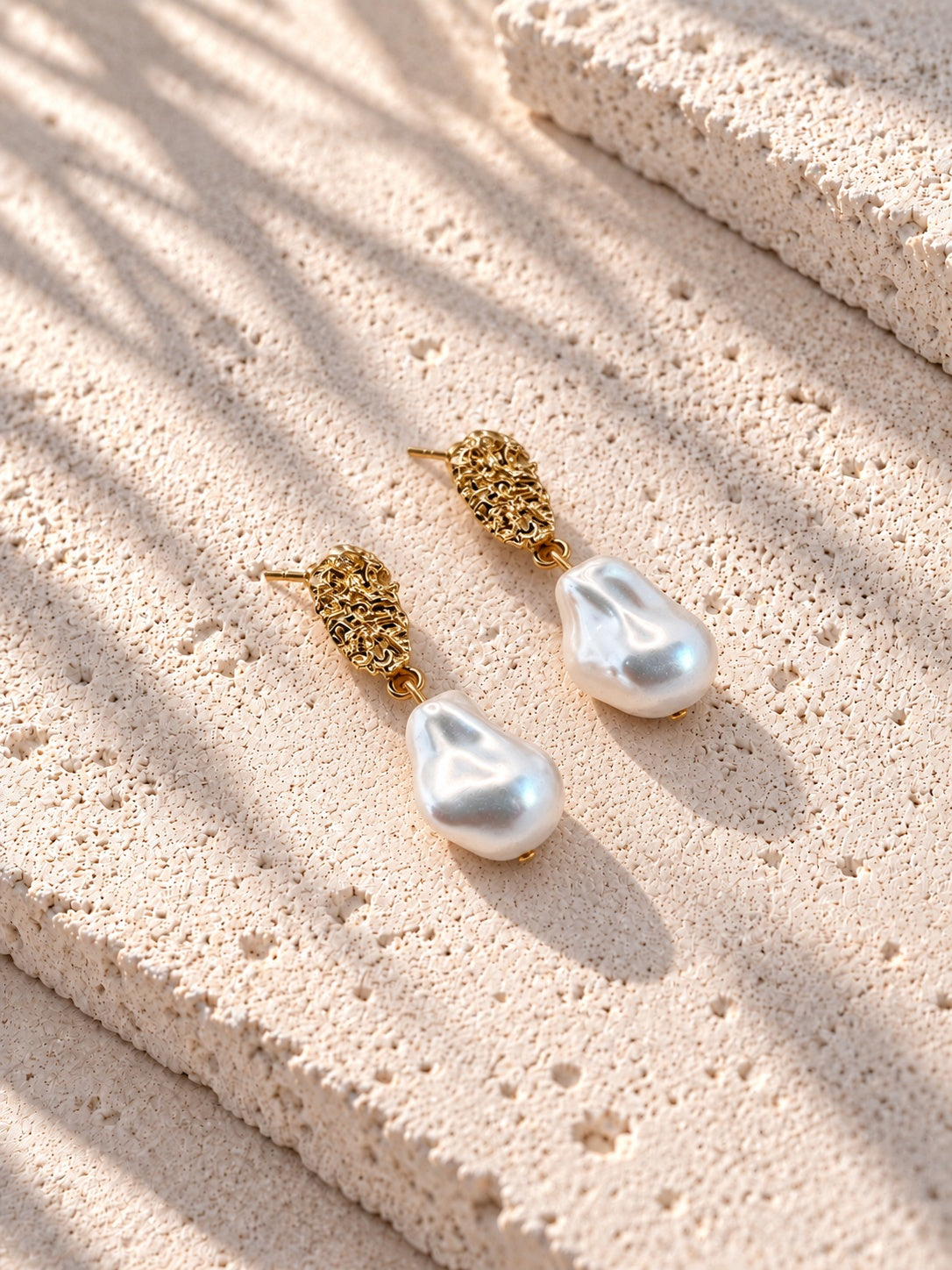 Textured gold tone baroque pearl drop earrings