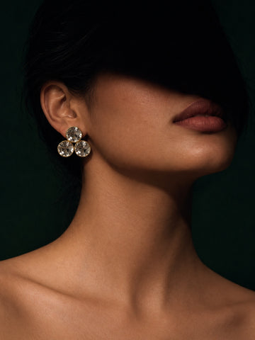 Niska triple crystal gold-tone stud earrings – model view