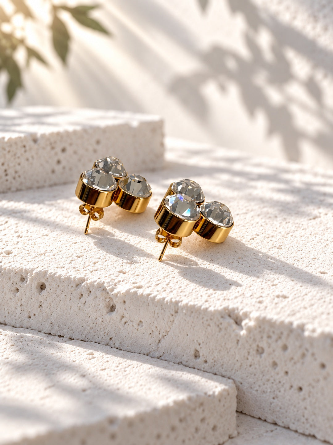 Niska triple crystal gold-tone stud earrings – side view