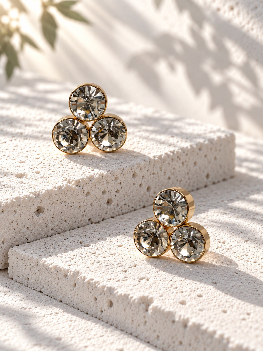 Niska triple crystal gold-tone stud earrings – staggered view