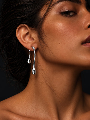 Silver tone asymmetric teardrop earrings