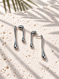 Silver tone asymmetric teardrop earrings