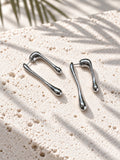 Silver tone asymmetric teardrop earrings