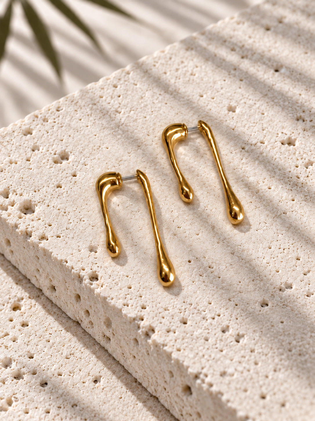 Gold-tone asymmetrical teardrop earrings