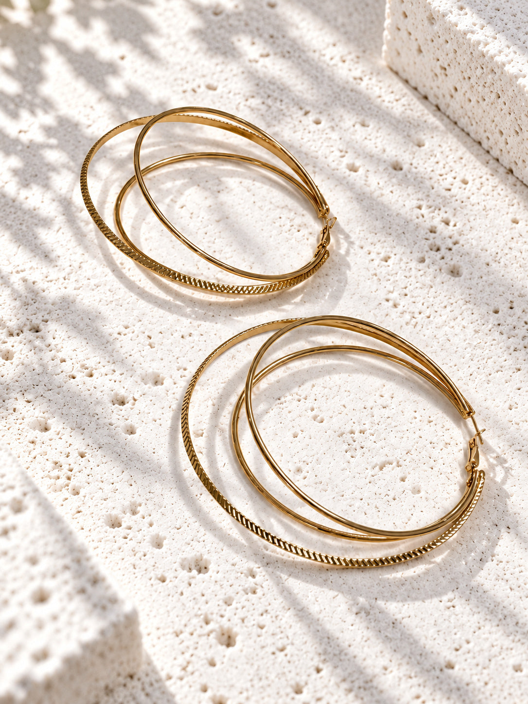 Oversized gold-tone layered hoop earrings