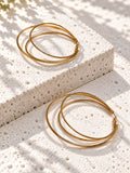 Oversized gold-tone layered hoop earrings