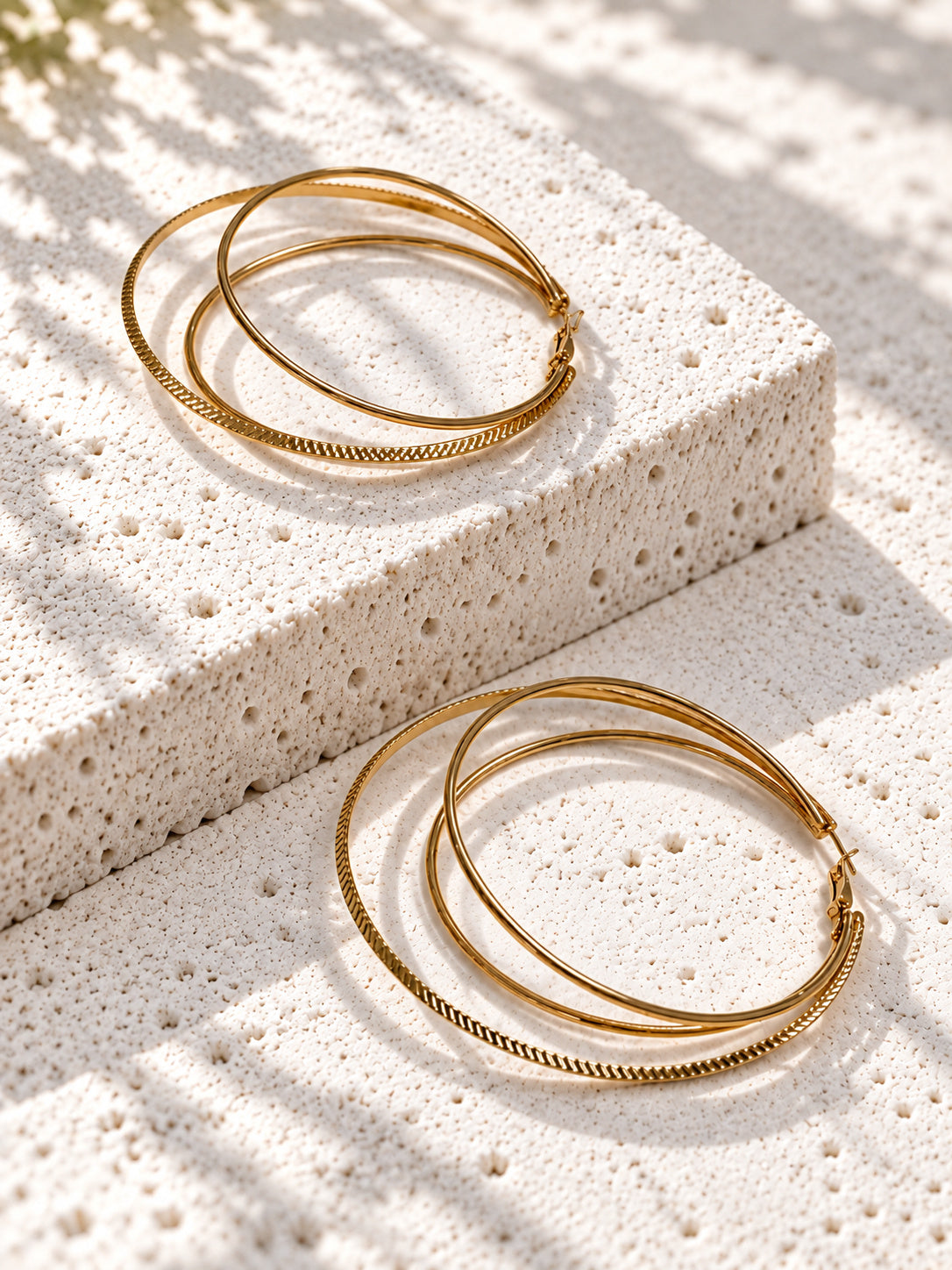 Oversized gold-tone layered hoop earrings