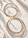 Oversized gold-tone layered hoop earrings