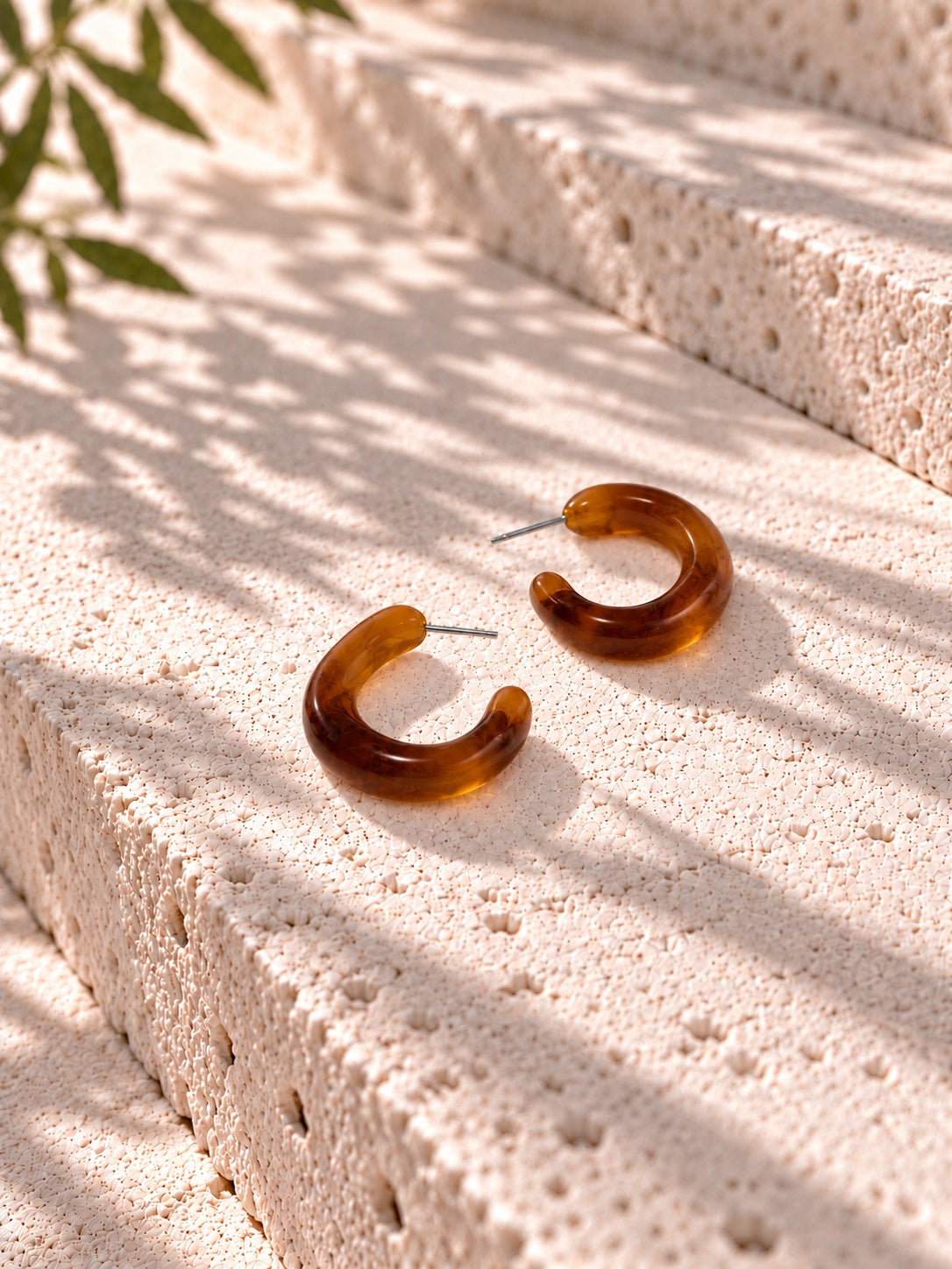 Niska amber Resin C-hoop earrings on white travertine - view 4