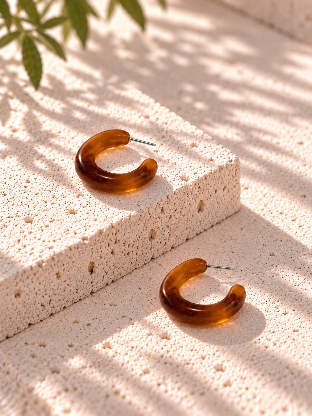 Niska amber Resin C-hoop earrings on white travertine - view 5