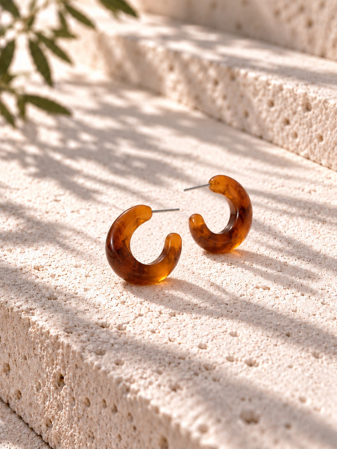 Niska amber Resin C-hoop earrings on white travertine - view 12