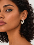 Niska ivory Resin hoop earring worn by model