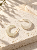 Niska ivory Resin hoop earrings on textured white stone