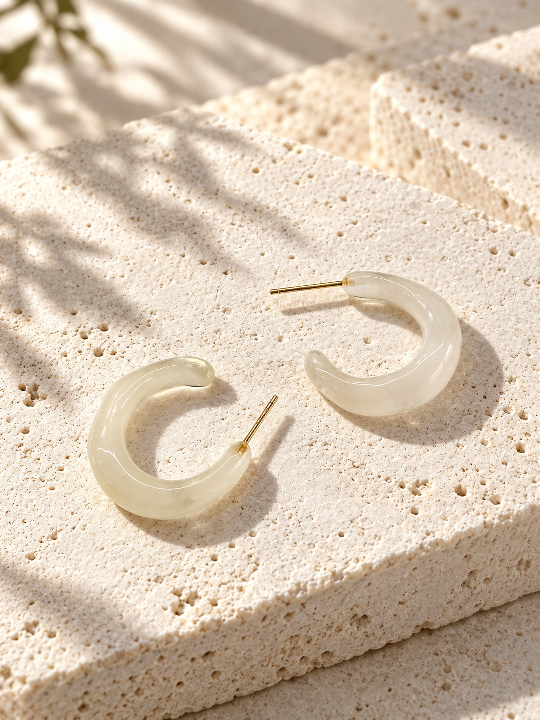 Niska ivory Resin hoop earrings on textured white stone