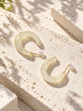 Niska ivory Resin hoop earrings on textured white stone